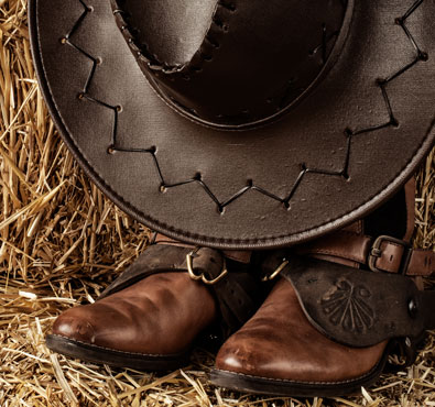 country western boots and cowboy hat